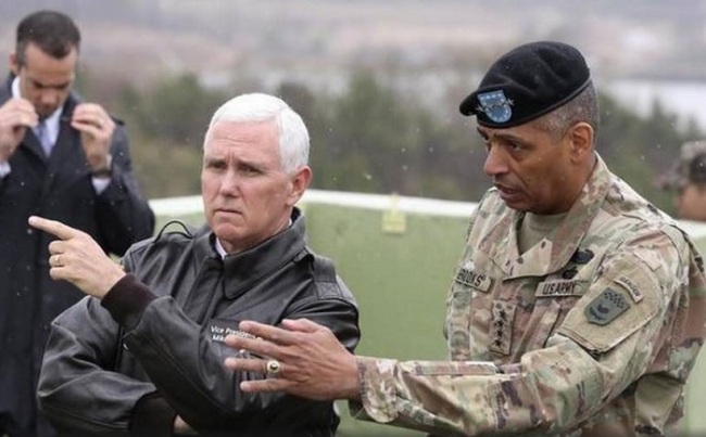 American Vice-President Mike Pence (left) is briefed by U.S. Gen. Vincent Brooks, commander of the United Nations Command, U.S. Forces Korea and Combined Forces Command, from Observation Post Ouellette in the Demilitarized Zone near the border village of Panmunjom, South Korea on April 17, 2017. (AP)