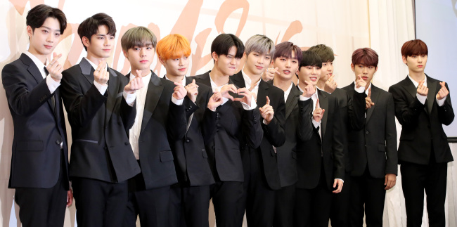 Wanna One poses during a press conference for its new EP “0+1=0 (I Promise You)” in Seoul on Monday. (Yonhap)