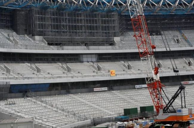 Part of the public seating area and a huge screen are seen at the construction site of the New National Stadium, the main stadium of Tokyo 2020 Olympics and Paralympics, during a media opportunity in Tokyo, Japan July 18, 2018. (Reuters)