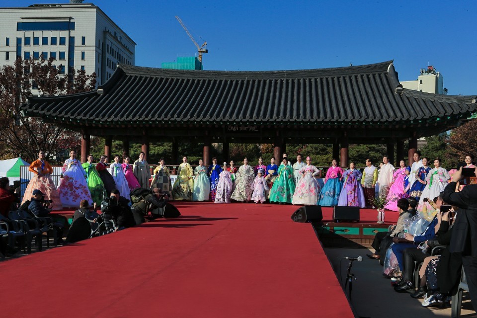 Models walk the runway finale at a hanbok show, organized by Korea Senior Star Association, at Namsangol Hanok Village in Seoul, Saturday. (Korea Senior Star Association)