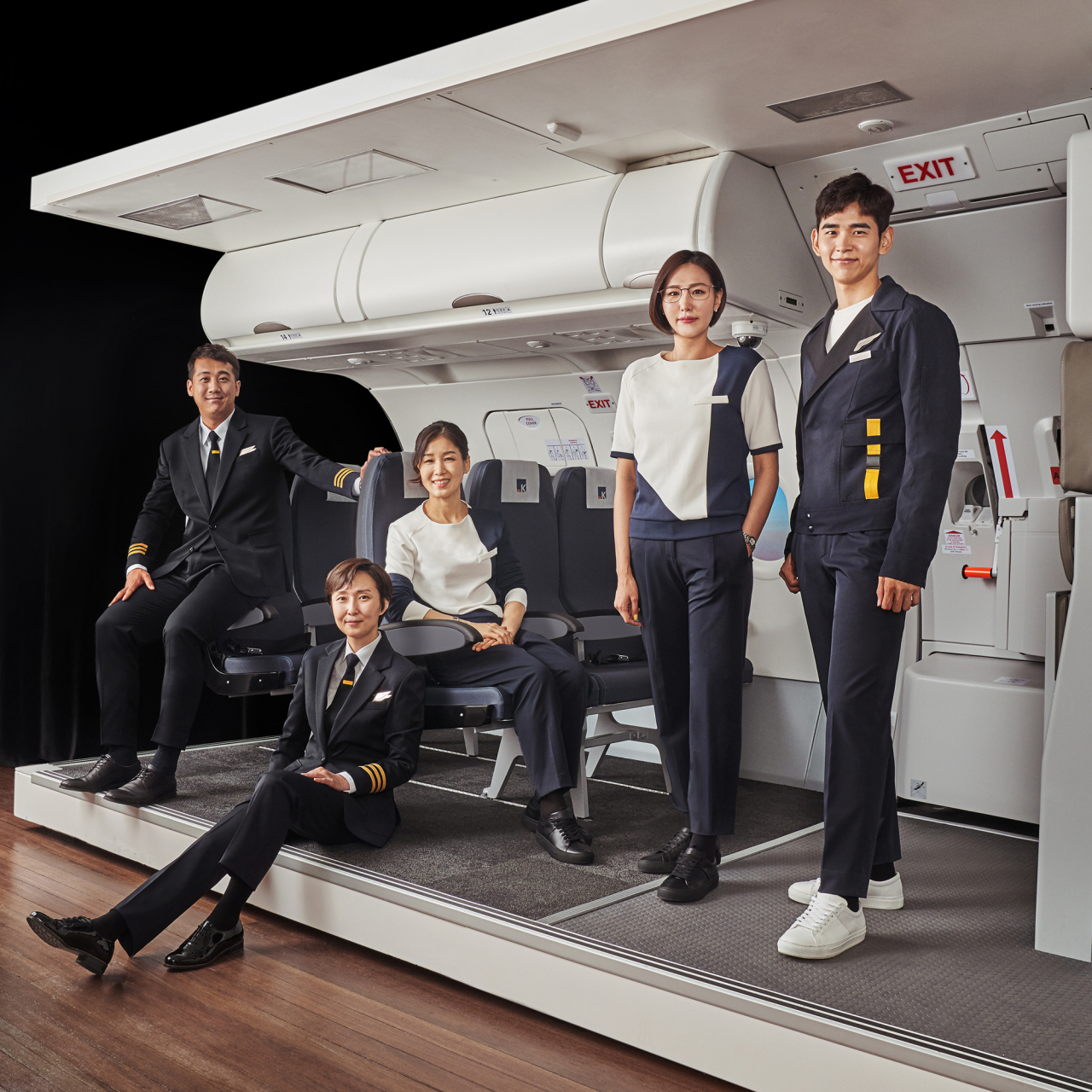 Aero K staff wear the airline‘s gender-neutral uniforms. (Aero K)
