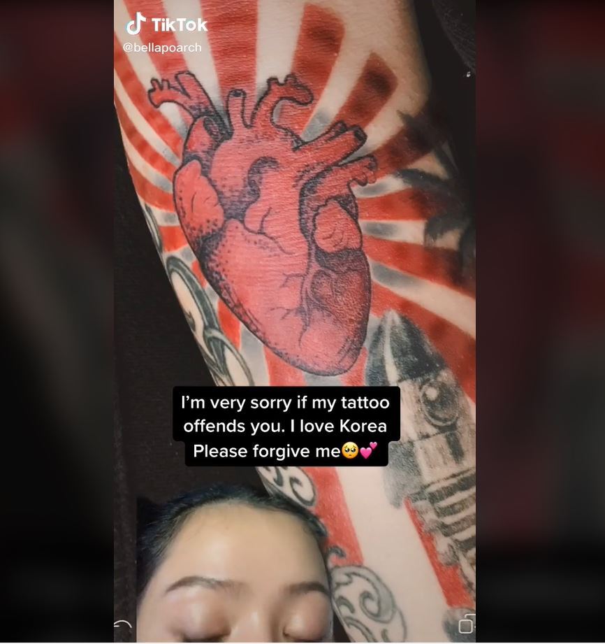 A Filipino American TikTok personality in Hawaii named Bella Poarch apologizes in a video for her tattoo design resembling the Rising Sun design. (TikTok Screen Capture)
