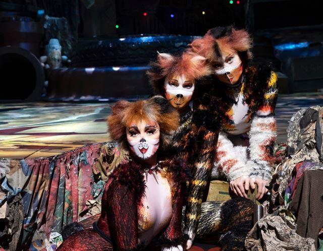 Three cast members of musical “Cats” wear masks with makeup on to match their characters’ appearance. (S&Co)