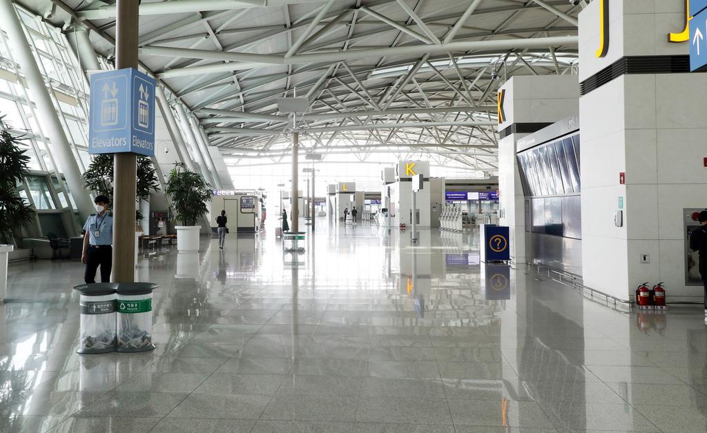 A nearly deserted terminal for international fights at Incheon International Airport on Aug. 16, South Korea's main gateway west of Seoul. (Yonhap)