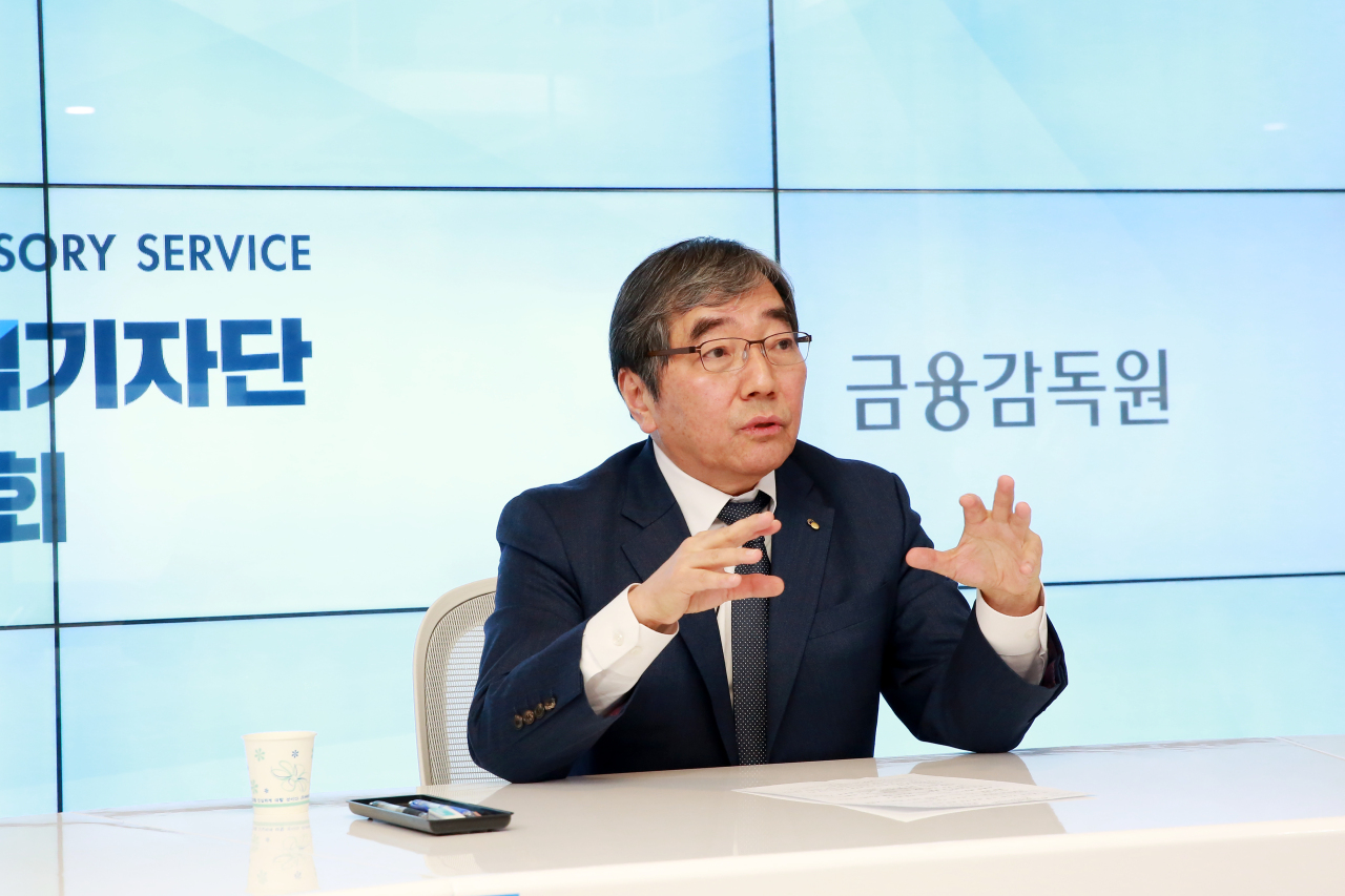 Financial Supervisory Service Gov. Yoon Suk-heun speaks at a press conference at the FSS building in Seoul, Wednesday, streamed online due to the COVID-19 resurgence. (Financial Supervisory Service)