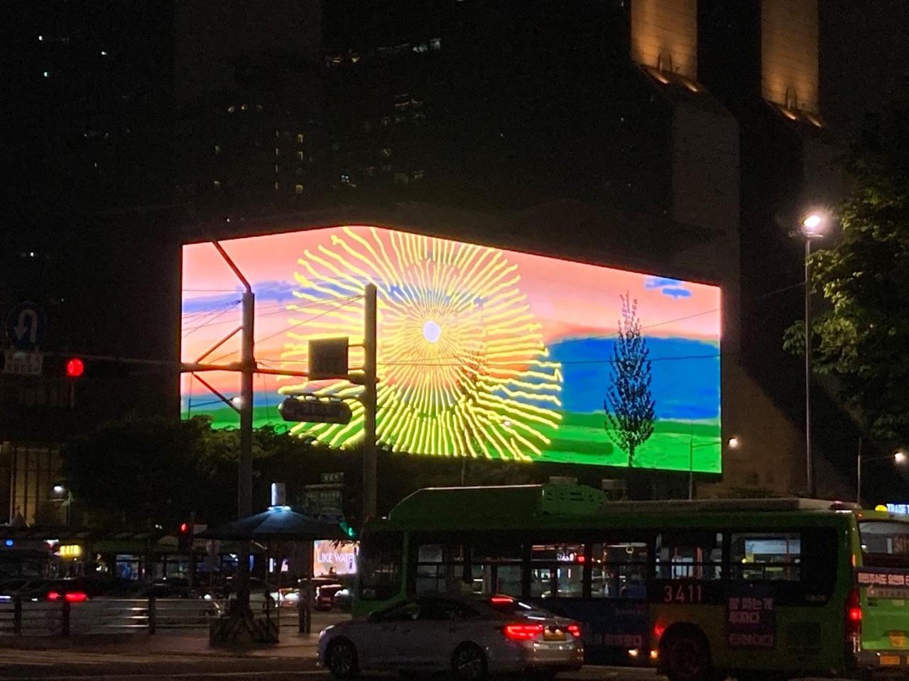 David Hockney’s “Remember you cannot look at the sun or death for very long” video is shown on the LED screen at K-pop Square in Samseong-dong, Seoul, Saturday. (Yonhap)
