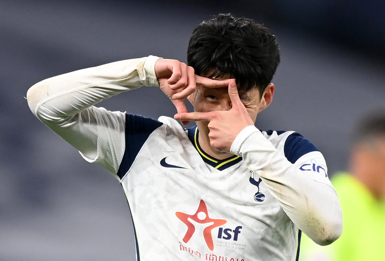 In this AFP photo, Tottenham Hotspur's South Korean striker Son Heung-Min celebrates scoring his team's fourth goal during the English Premier League football match between Tottenham Hotspur and Sheffield United at Tottenham Hotspur Stadium in London on Sunday. (AFP-Yonhap)