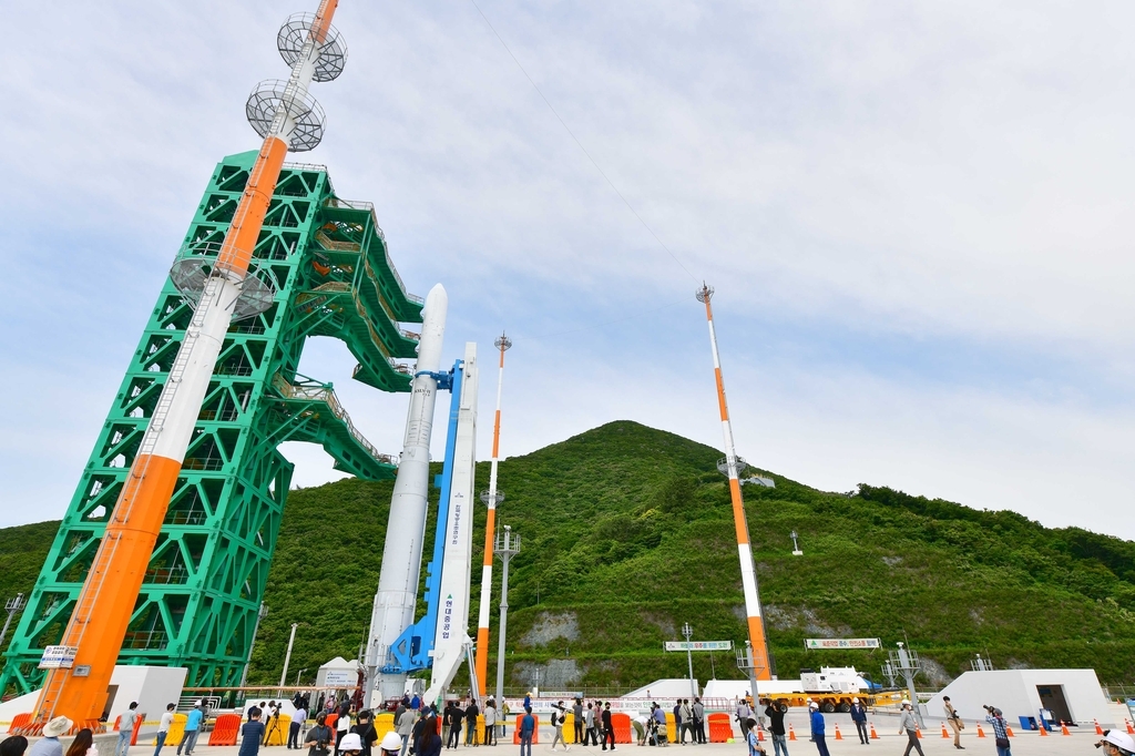 A model of South Korea's homegrown space rocket Nuri is connected to a launch pad at the Naro Space Center in Goheung, 473 kilometers south of Seoul, on Tuesday, in this photo provided by the Korea Aerospace Research Institute. (Korea Aerospace Research Institute)