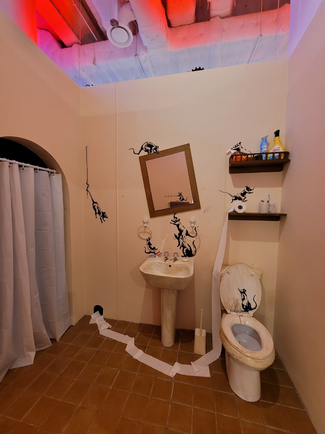 A reproduction of Banksy’s “Bathroom” shown at the exhibition “The Art of Banksy - Without Limits” (Park Yuna/The Korea Herald)