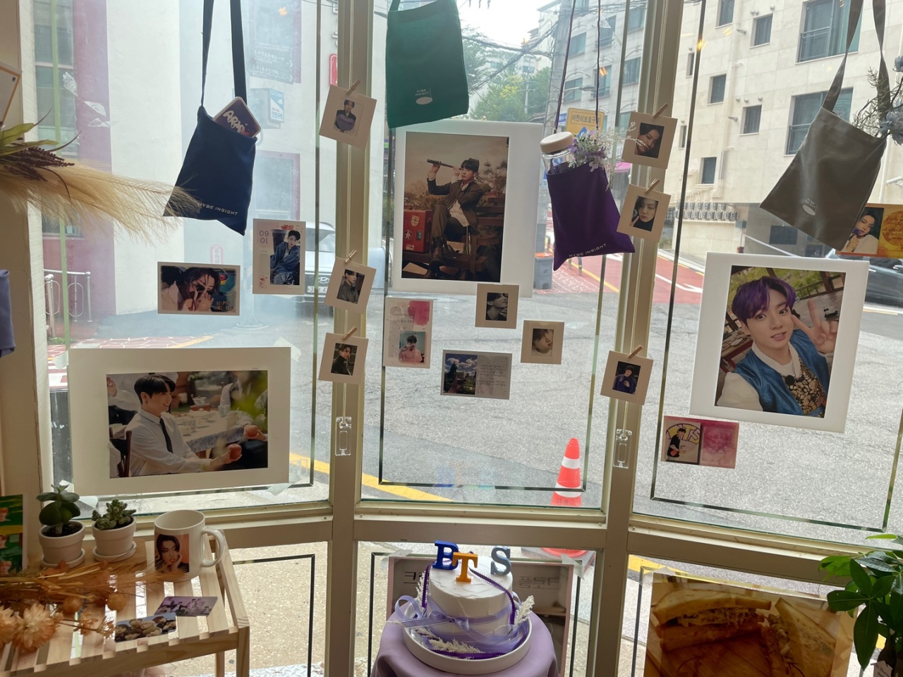 Exclusive goodies are displayed on the awning windows to celebrate Jung-kook‘s birthday. (Kweon Ha-bin/The Korea Herald)