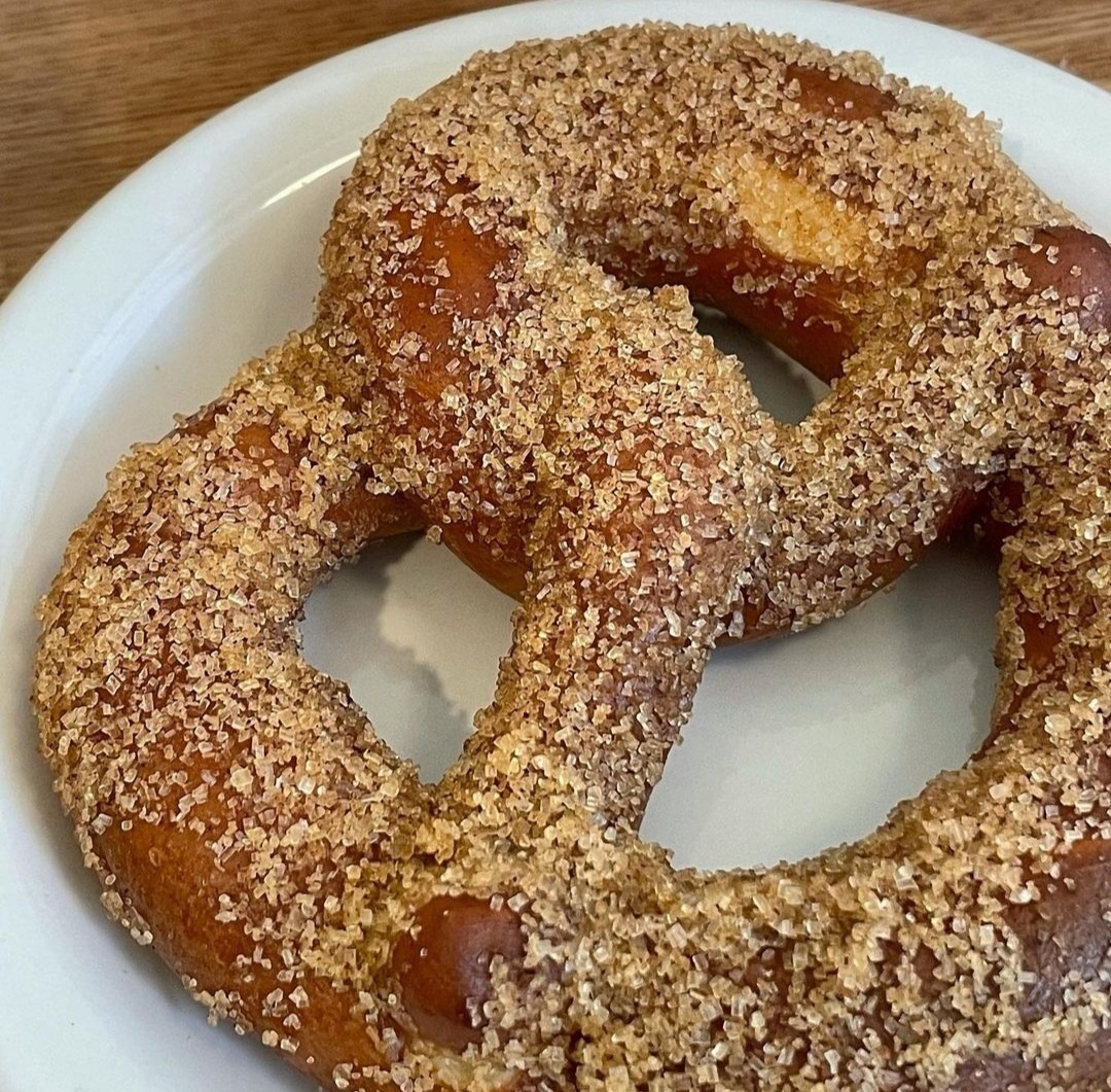 Backerin's Sweet Cinnamon Pretzels are glossy with a layer of butter before being generously topped with a second layer of cinnamon and sugar.  (Photo credit: @backerin_seoul)