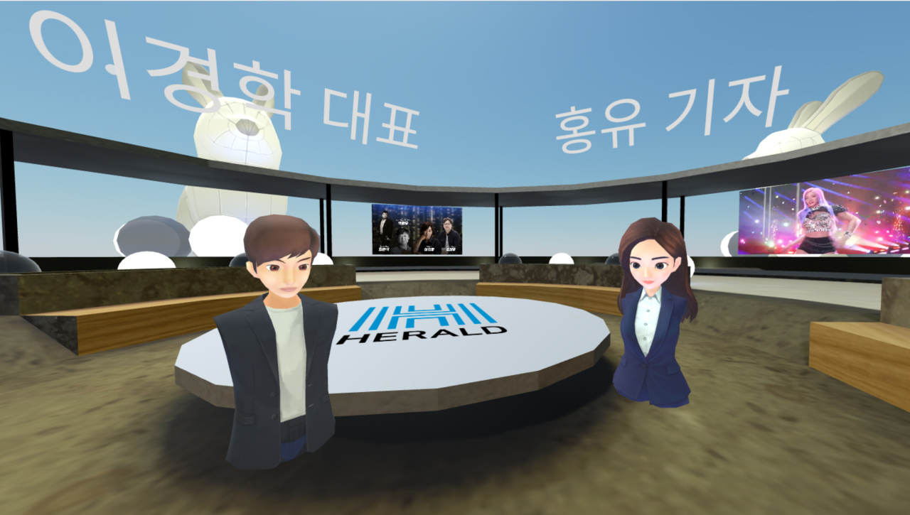 The Korea Herald reporter Hong Yoo (right) greets Warpsolution CEO Lee Gyeong-hak at an interview conducted in the metaverse. The event was the first such media interview held via virtual reality in South Korea. (Metafactory)