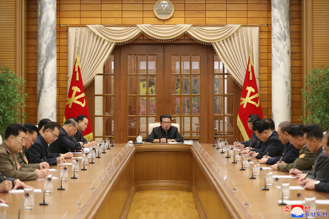 North Korean leader Kim Jong-un (center) convenes a politburo meeting of the country’s ruling Workers’ Party of Korea in Pyongyang on Wednesday, during which it decided to hold a plenary meeting later this month. (KCNA-Yonhap)