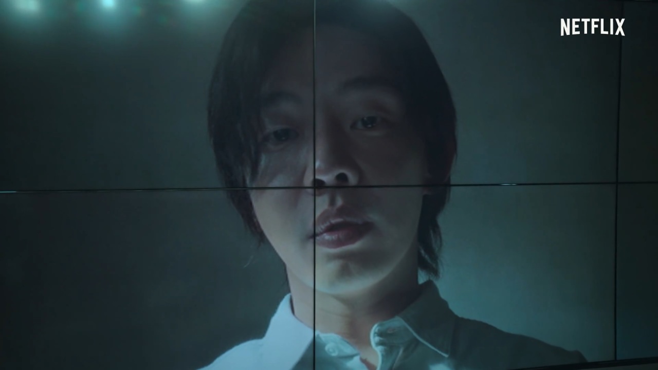 The New Truth’s leader Jung Jin-su (Yoo Ah-in) glares at viewers in “Hellbound.” (Netflix)