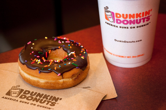 A chocolate glazed donut and a cup of coffee at a Dunkin‘ Donuts store in West Orange, New Jersey. (Bloomberg)