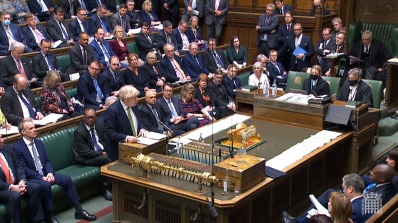 A video grab from footage broadcast by the UK Parliament's Parliamentary Recording Unit (PRU) shows Britain's Prime Minister Boris Johnson speaking as he updates MPs on the situation in Ukraine and sanctions to be made against Russia, in the House of Commons, in London, Tuesday. (AP)