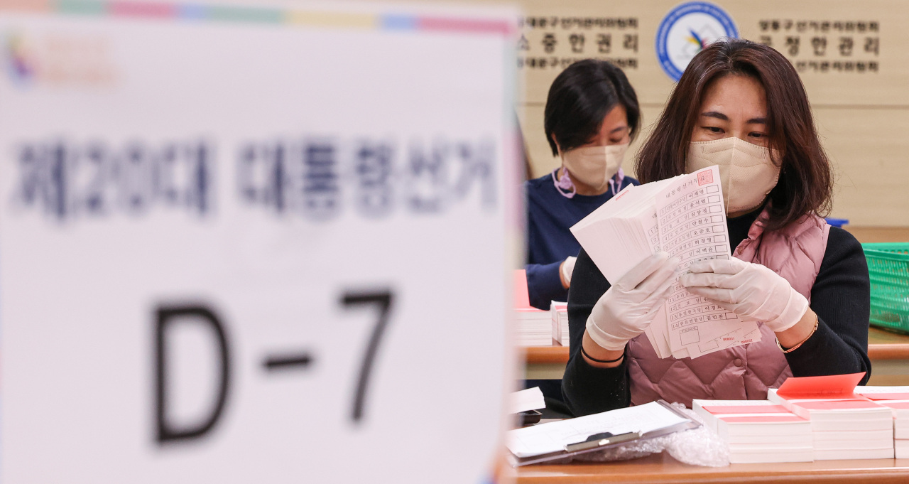 Officials check ballots Wednesday at an office of the National Election Commission in Dongdaemun-gu, eastern Seoul, seven days ahead of the 20th presidential election. (Yonhap)