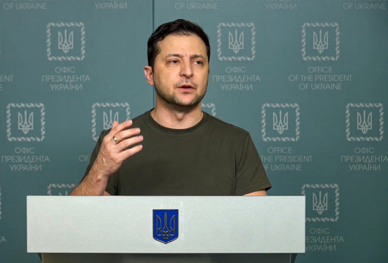 In this photo, taken last Sunday from video provided by the Ukrainian Presidential Press Office, Ukrainian President Volodymyr Zelenskyy speaks to the nation in Kyiv, Ukraine. Russian state media is spreading false claims that Ukrainian President Volodymyr Zelenskyy has fled Kyiv in what experts say is an effort to discourage Ukrainians and erode support for Ukraine around the globe. (Ukrainian Presidential Press Office)