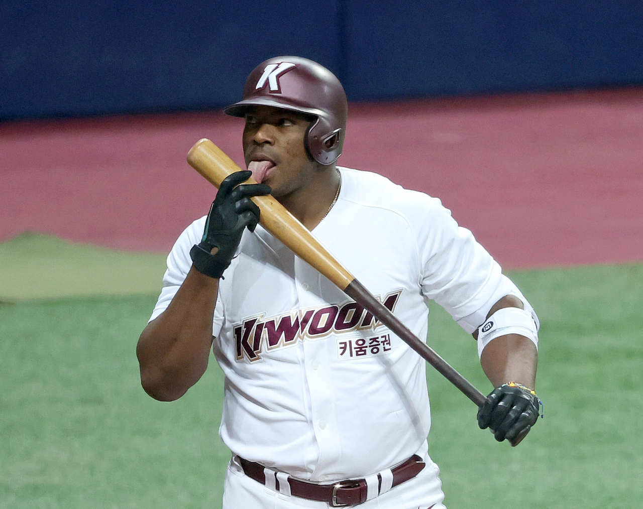 Yasiel Puig of the Kiwoom Heroes licks his bat before stepping into the box against the LG Twins in the bottom of the second inning of a Korea Baseball Organization preseason game at Gocheok Sky Dome in Seoul on Monday. (Yonhap)