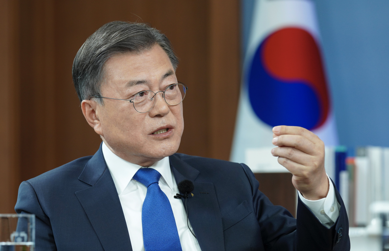 President Moon Jae-in speaks during an interview with the broadcaster JTBC at Cheong Wa Dae on April 14, 2022, in this file photo released by the presidential office. The interview was aired on April 25. (Presidential office)