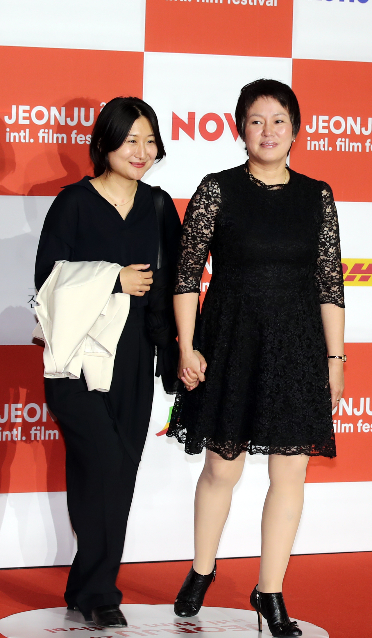 Director Jeong Ji-hye (left) and actor Kim Geum-soon from “Jeong-sun,” pose at the opening ceremony of the 23rd Jeonju International Filn Festival in Jeonju, North Jeolla Province on April 28. (Yonhap)