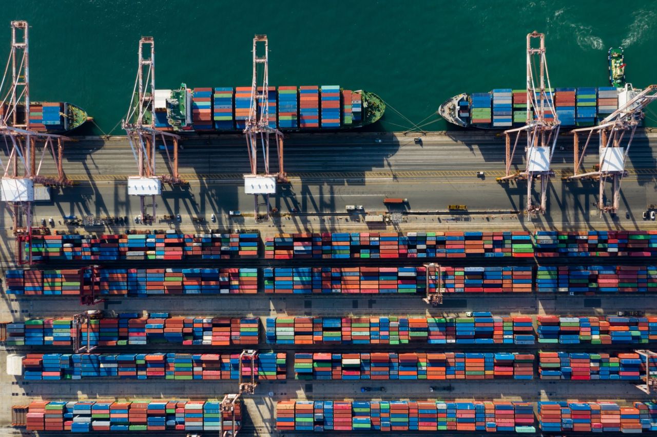 Container ships are docked as shipping containers sit in the Busan Port Terminal in this file photo taken in Busan, on Oct. 13, 2020. (Bloomberg)