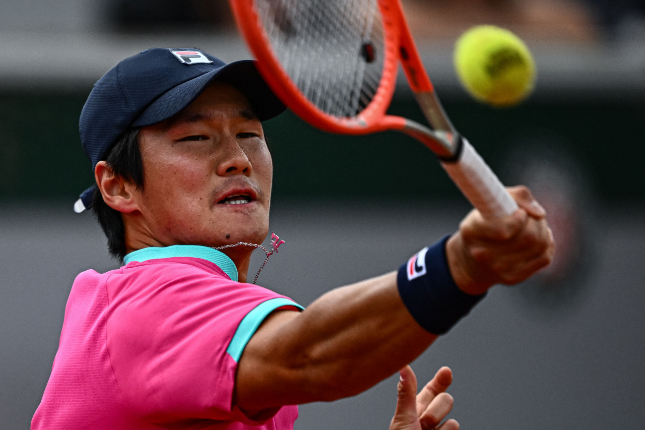 South Korea's Soonwoo Kwon returns the ball to Russia's Andrey Rublev during their men's singles match on day three of the Roland-Garros Open tennis tournament at the Court 14 in Paris on Tuesday.(AFP)