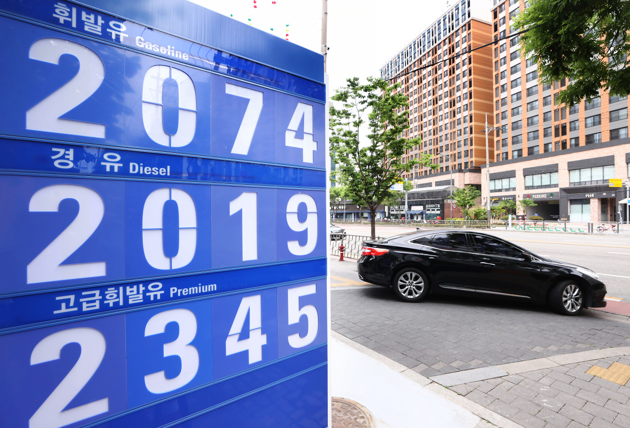 This photo taken on Sunday, shows a board displaying fuel prices at a gas station in Seoul. (Yonhap)