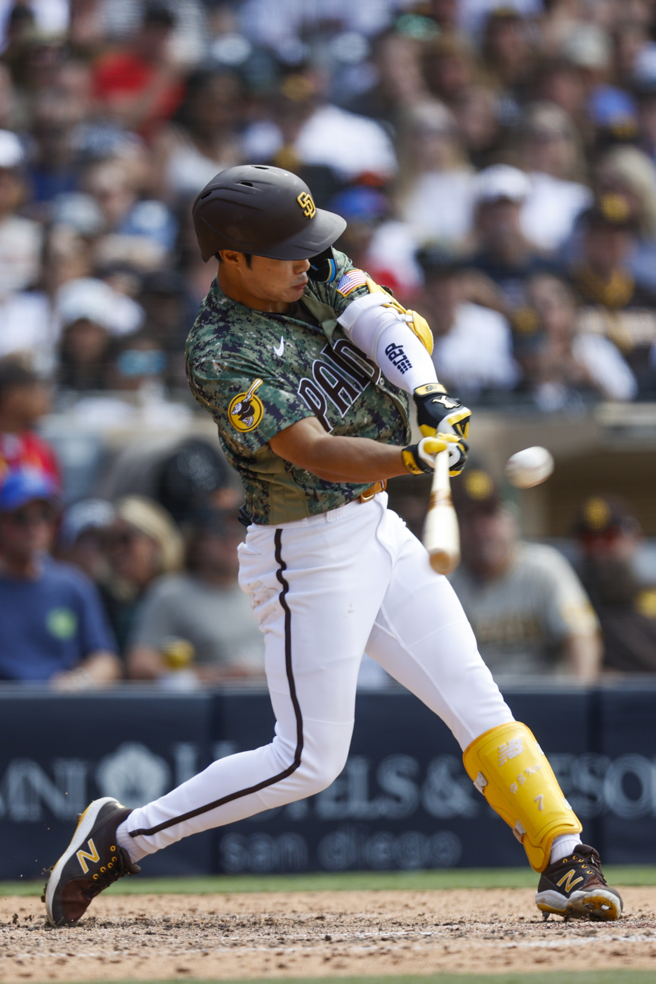 In this USA Today Sports photo via Reuters, Kim Ha-seong of the San Diego Padres hits a single against the Pittsburgh Pirates during the bottom of the eighth inning of a Major League Baseball regular season game at Petco Park in San Diego on Sunday. (Reuters)
