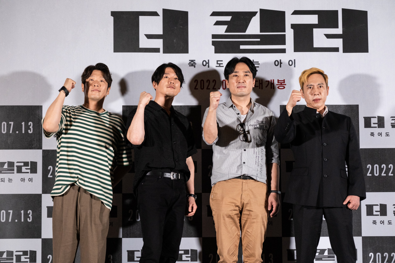 From left: Actors Choi Gi-seop, Jang Hyuk, director Choi Jae-hoon and actor Bruce Khan pose for photos after a press conference held at Yongsan CGV on Monday. (iHQ)