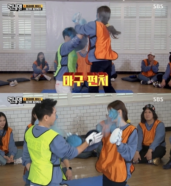 South Korean entertainers Kim Jong-guk and Jeong Jun-ha punch each other during an episode of the popular SBS variety show “Running Man.” (SBS)