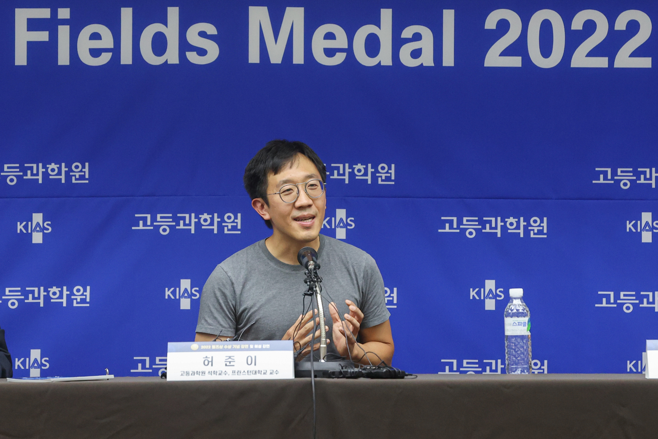 Korean American mathematician June Huh, winner of Fields Medal 2022, speaks to reporters in a press conference at the Korea Institute for Advanced Study in Seoul on Wednesday. (Yonhap)