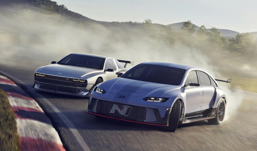 This file photo provided by Hyundai Motor shows the N Vision 74 (L) and the RN22e rolling lab concept cars. (Hyundai Motor)