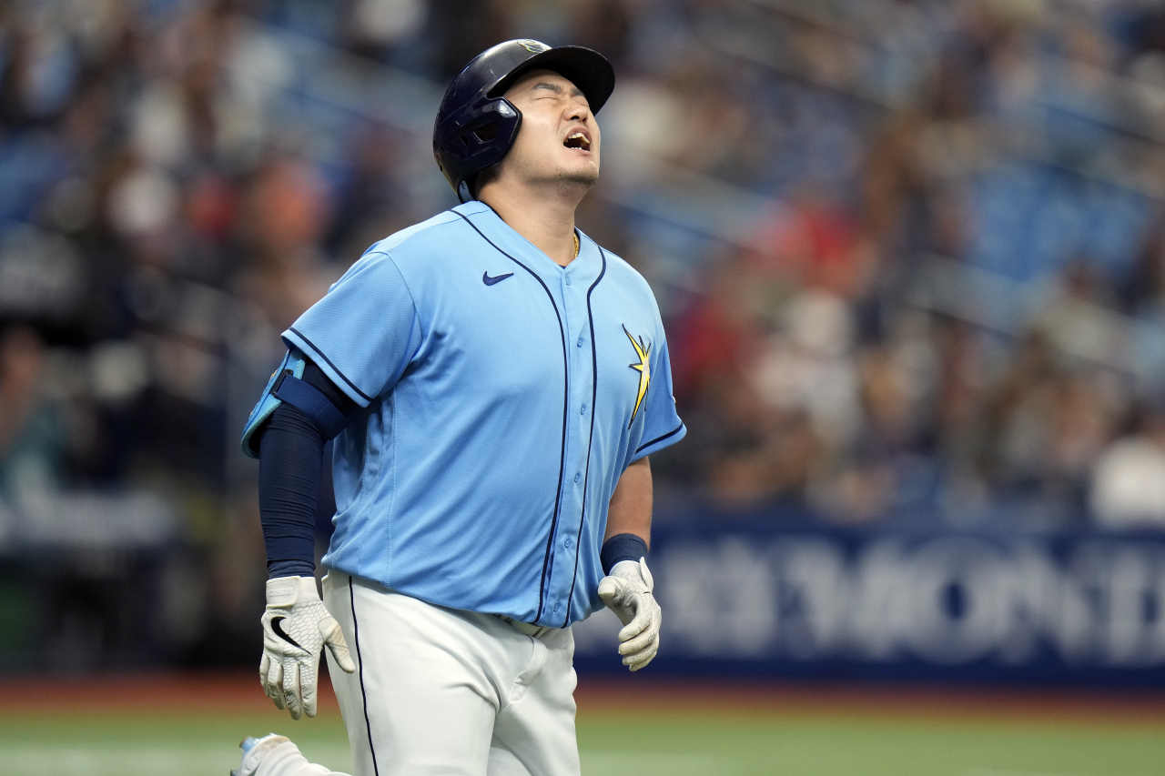 In this Associated Press photo, Choi Ji-man of the Tampa Bay Rays reacts after hitting a sacrifice fly against the Cleveland Guardians during the bottom of the fourth inning of a Major League Baseball regular season game at Tropicana Field in St. Petersburg, Florida, on Sunday. (AP)