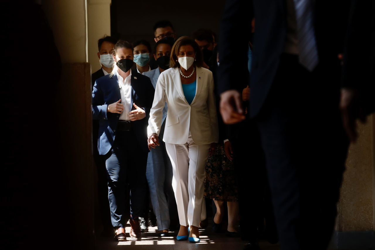 US House Speaker Nancy Pelosi walks after leaving the Legislative Yuan after her meeting with Taiwanese legislators in Taipei, Taiwan, 03 August 2022. Pelosi began her visit in Taiwan, the highest ranking US official to visit the island in 25 years, despite strong warnings of military action from China against the visit. (EPA)