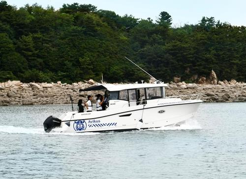 This file photo taken July 12, 2022, and provided by Avikus, a unit of South Korea's leading shipbuilding group, HD Hyundai, shows a leisure boat equipped with its autonomous navigation system at Wangsan Marina in Incheon, around 30 kilometers west of Seoul. (Avikus)
