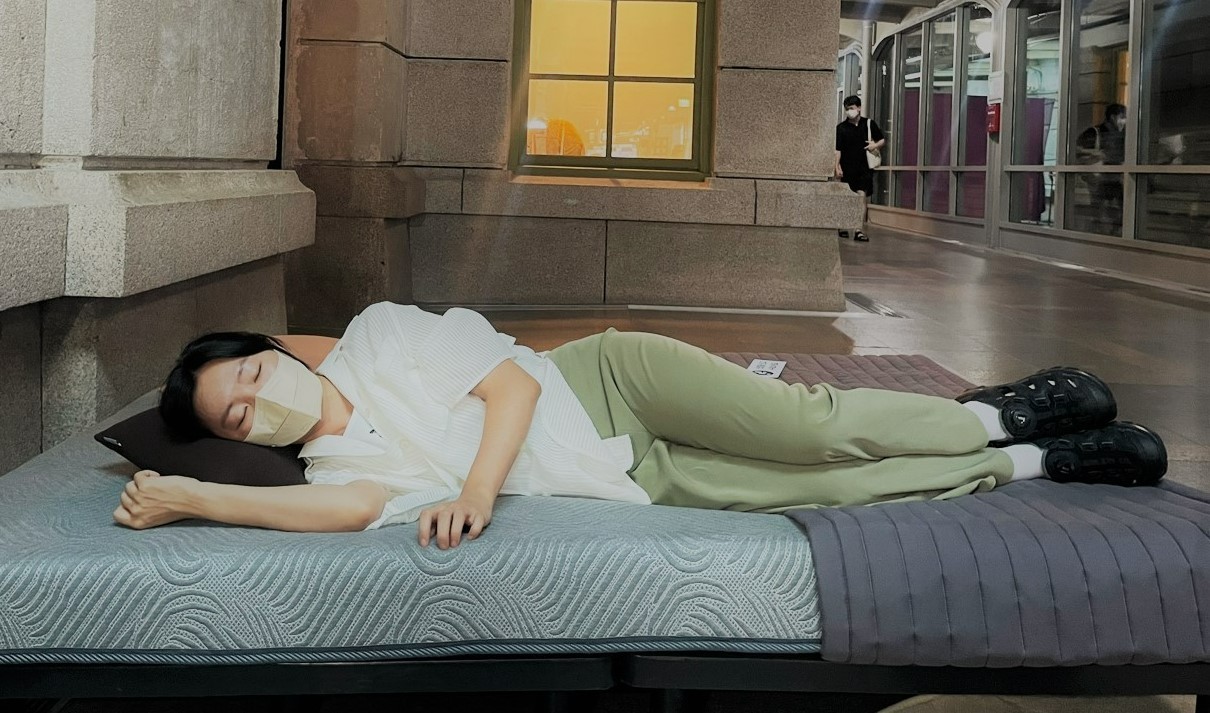 A visitor rests at an exhibition titled “My Sleep” at Culture Station Seoul 284. (Park Ga-young/The Korea Herald)