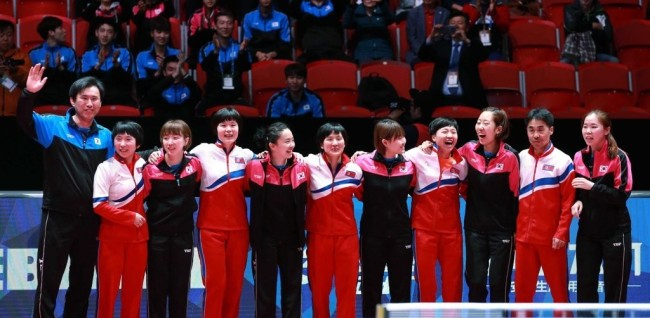 Members of the unified Korean women's table tennis team pose for pictures the World Team Table Tennis Championships at Halmstad Arena in Halmstad, Sweden, on July 4, 2018. (Yonhap)
