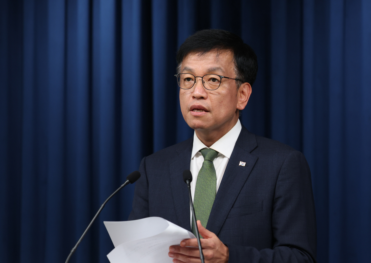 Choi Sang-mok, senior presidential secretary for economic affairs, briefs reporters at the presidential office in Seoul on Friday. (Yonhap)