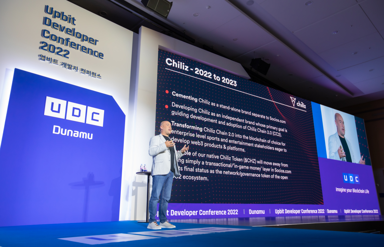 CEO of Socios and Chiliz Alexandre Dreyfus speaks at the 2022 UDC held in Busan on Friday. (Dunamu)