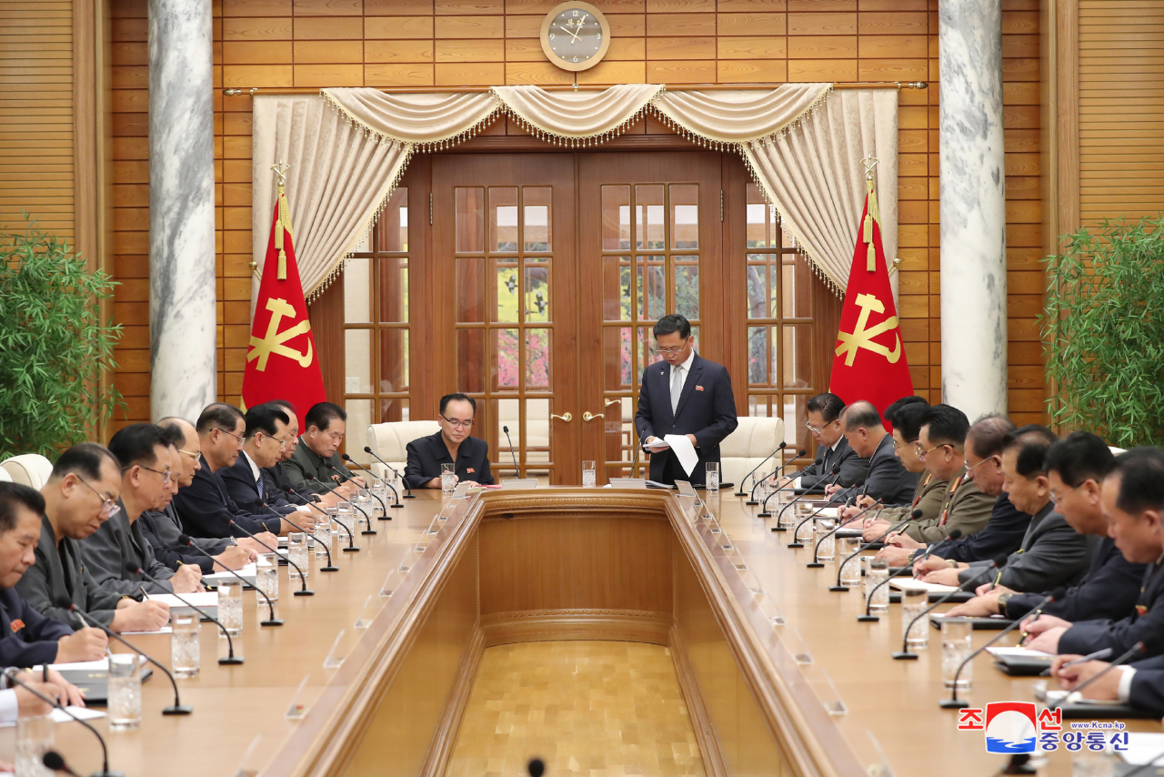 The political bureau of the central committee of North Korea's Workers' Party holds a meeting in Pyongyang on Sunday to review the country's agricultural output for this year, in this photo released by the North's Korean Central News Agency the following day. North Korean leader Kim Jong-un did not attend it. (KCNA)