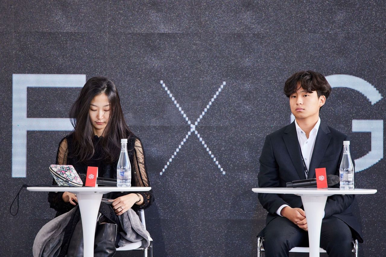 Actors Choi Seung-yoon (left) and Ethan Hwang attend an event at the 27th Busan International Film Festival. (Yonhap)