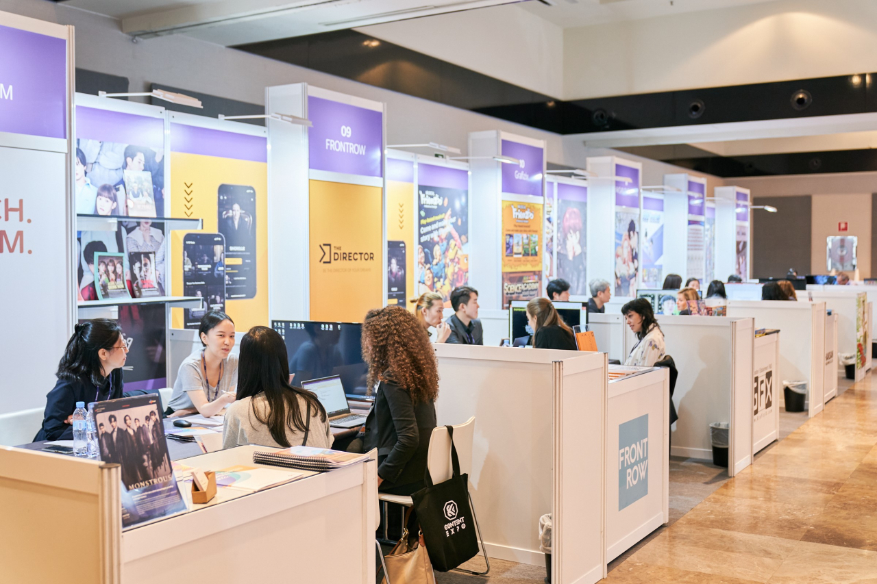 Foreign buyers consult with South Korean content companies at booths set up at the K-Content Expo in Spain 2022, held in Madrid last week. (KOCCA)