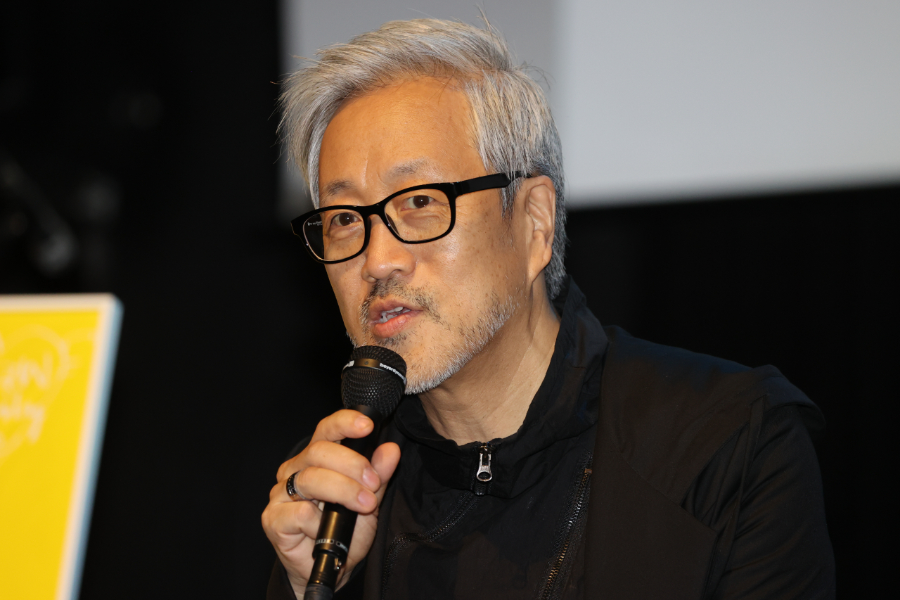 SSaW's Kim Jong-jin speaks during a press conference to celebrate the release of the seventh full-length album 
