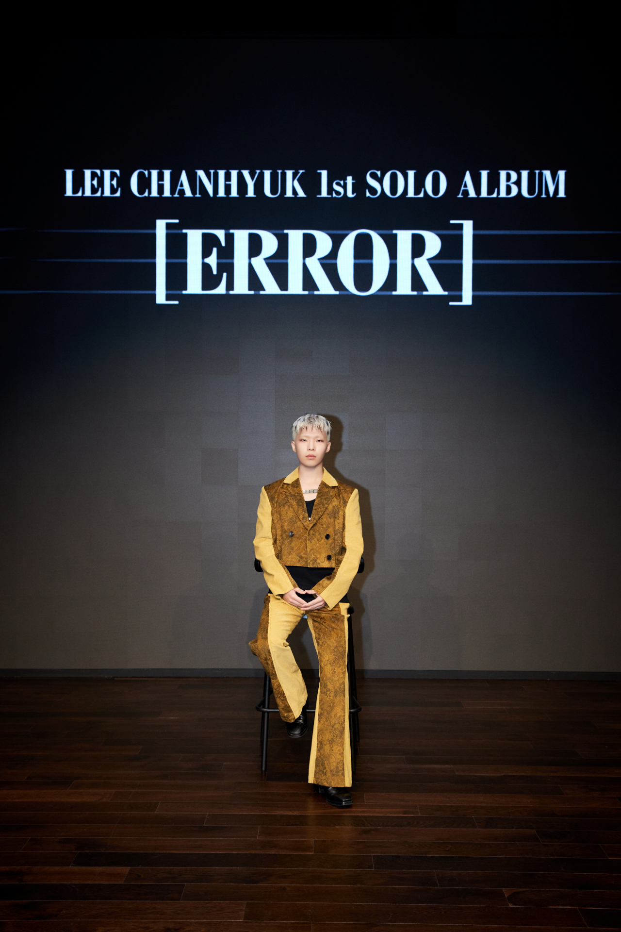 Lee Chan-hyuk poses during a press conference for his first solo album, “Error,” at YG Entertainment in Mapo-gu, western Seoul, on Monday. (YG Entertainment)