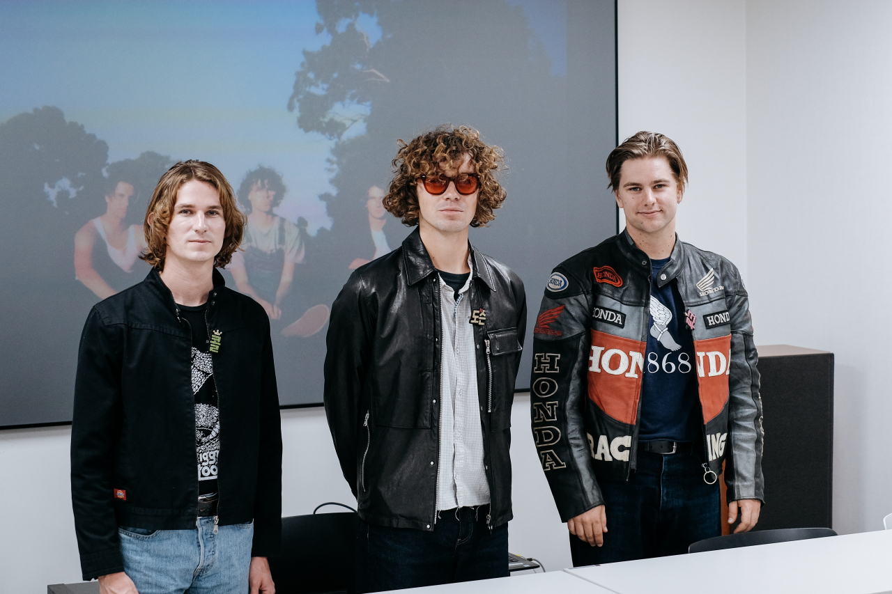 American alt-pop band almost monday poses for photos during a press conference held at Universal Music Korea’s headquarters in Gangnam-gu, southern Seoul, Tuesday. (Universal Music Korea)