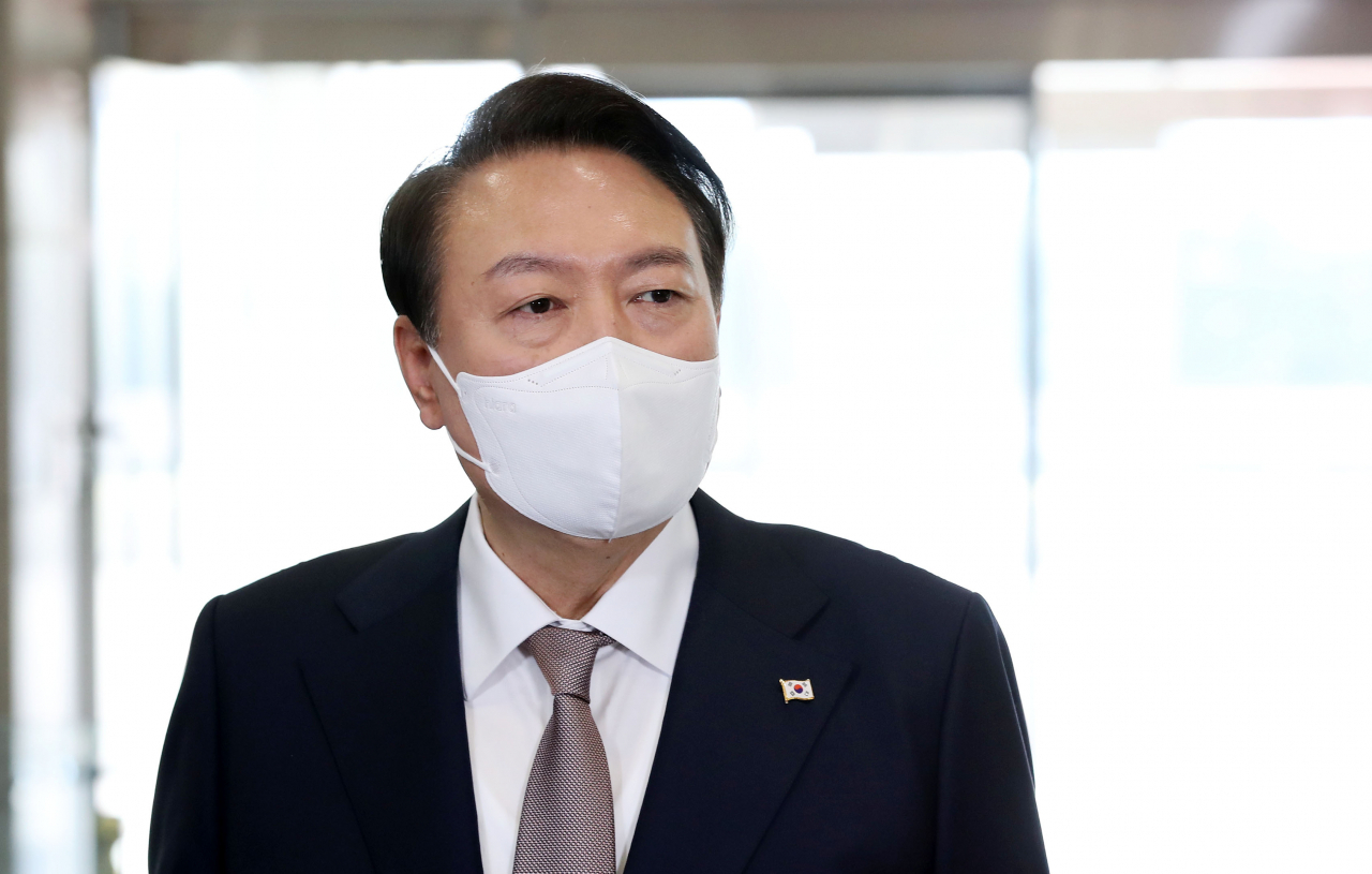 President Yoon Suk-yeol speaks to reporters at the presidential office in Seoul on Thursday. (Yonhap)