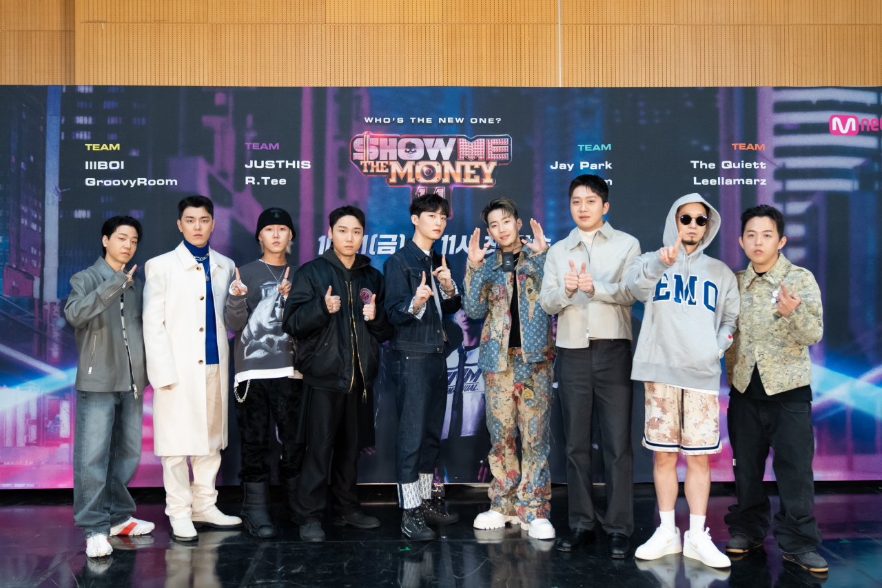 From left: Lil Boi, GroovyRoom's Kyujung and Hwimin, Justhis, R.Tee, Jay Park, Slom, the Quiett and Leellamarz pose for photos during an online press conference for the 11th season of Mnet's “Show Me the Money,