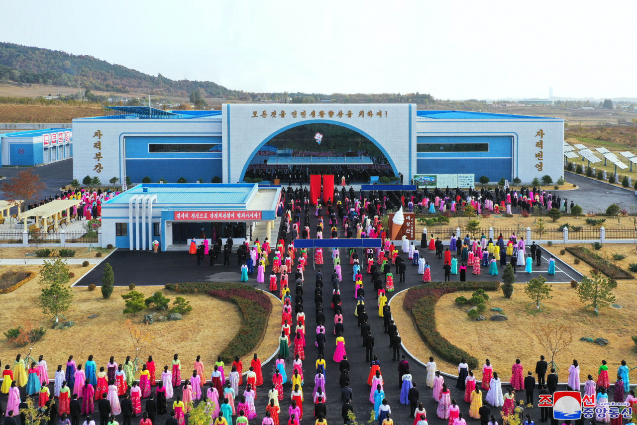 This photo, released on Thursday, shows the completion ceremony of an ice cream factory in Taesongsan in Pyongyang. (KCNA)