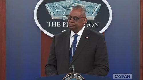 Secretary of Defense Lloyd Austin is seen answering questions during a press briefing at the Pentagon in Washington on Thursday on the release of the US National Defense Strategy in this image captured from the website of US news network C-Span. (C-Span)